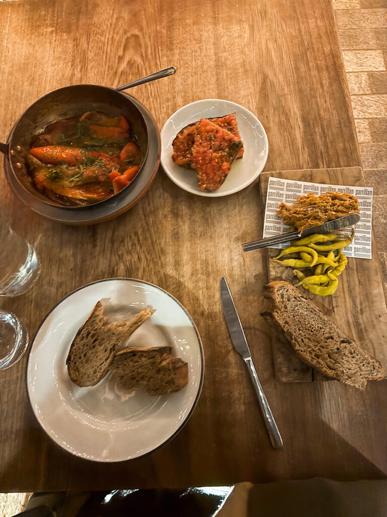 a few plates of tapas in Parillan, a Spanish restaurant located in Borough Yards in London