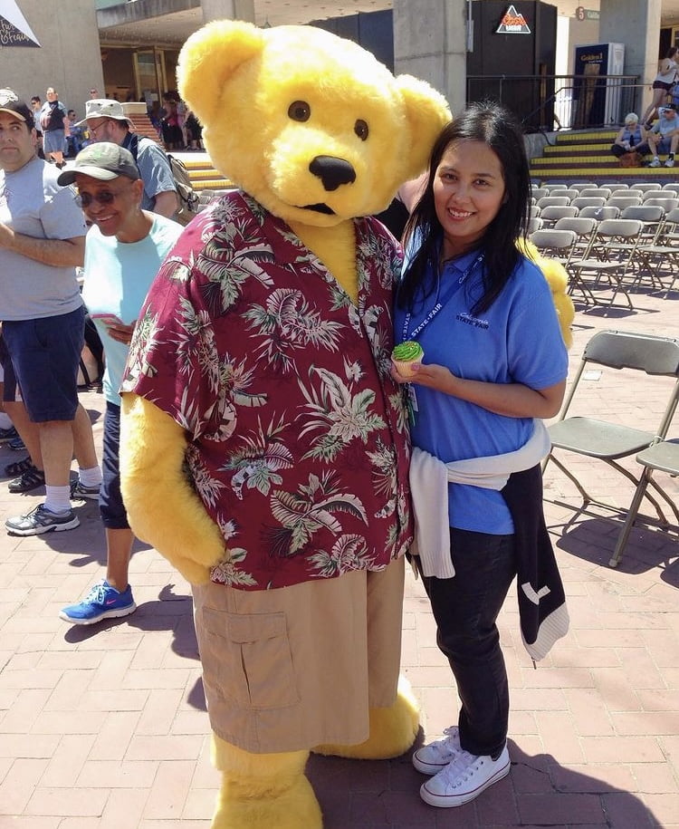 Intern with Poppy, the mascot at California State Fair