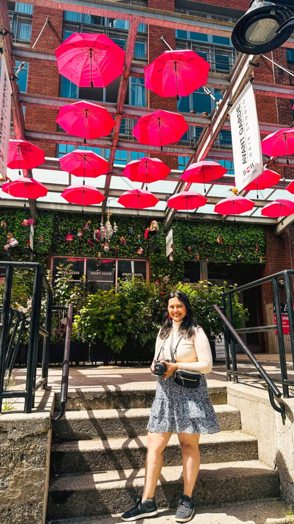 Woman under the umbrella art installation in Yaletown in Vancouver