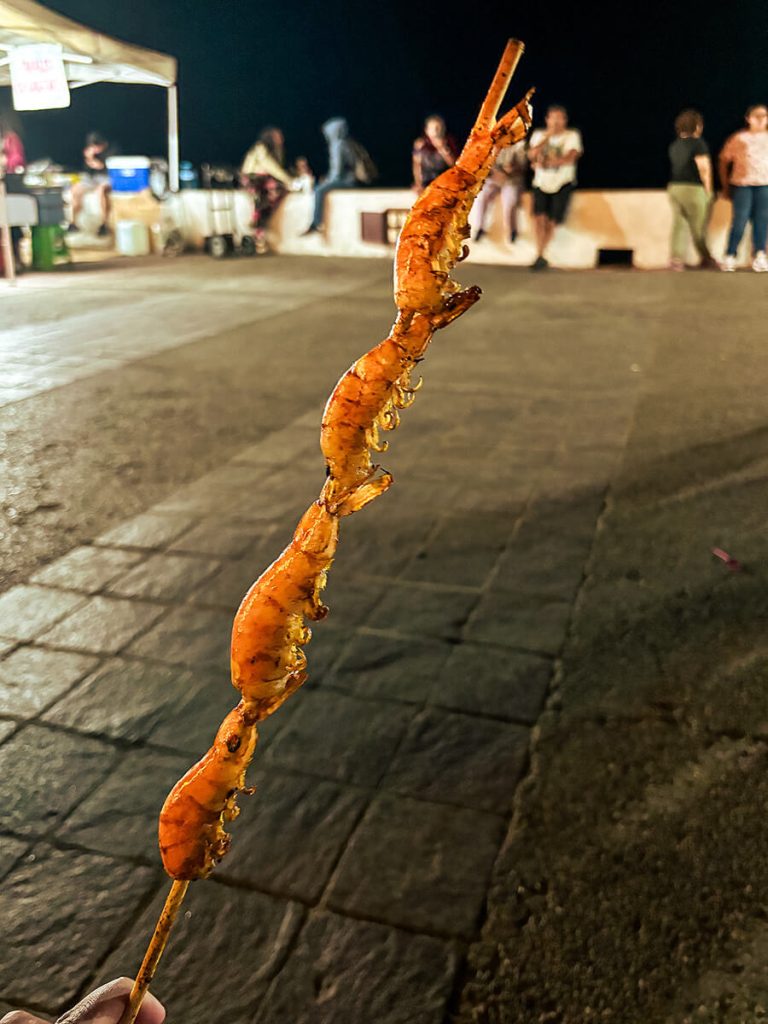 camarones a la plancha (grilled shrimp skewers), sold from one of the street food vendors on the Malecon Boardwalk in Puerto Vallarta, Mexico