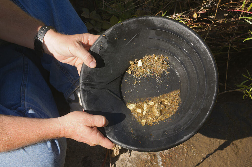 A man going gold panning
